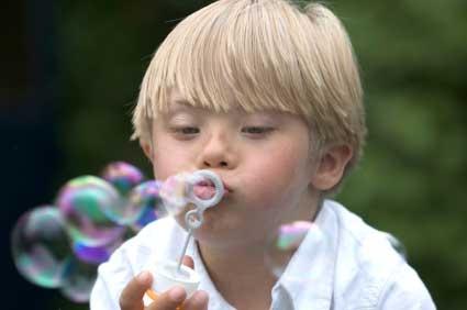 Boy blowing bubble