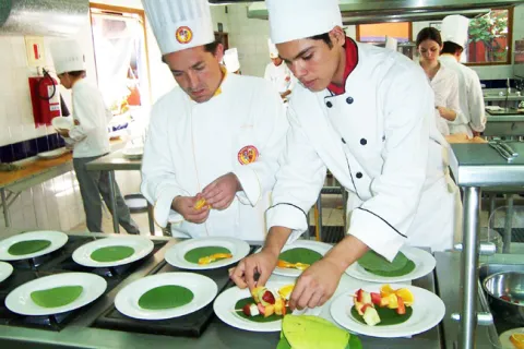 chefs plating food