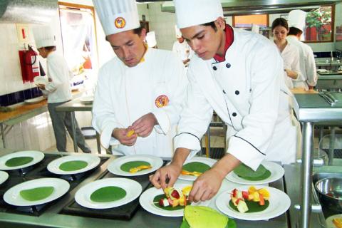 chefs plating food