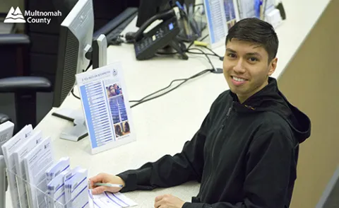 Voter registers to vote at the Multnomah County Duniway-Lovejoy Elections Building