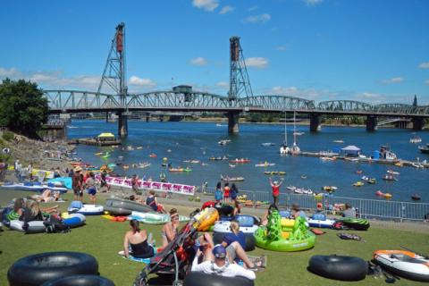 people floating on the Willamette River in Portland