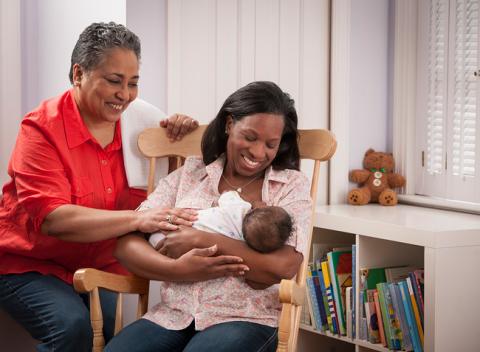 breastfeeding mom in the nursery