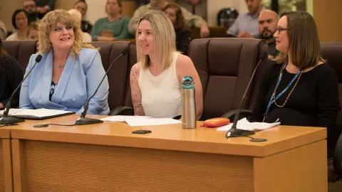 From left: IDEA Employee Resource Group members Jill Jesse, Ashley Carroll and Alison Sachet, Ph.D. of the Department of County Management