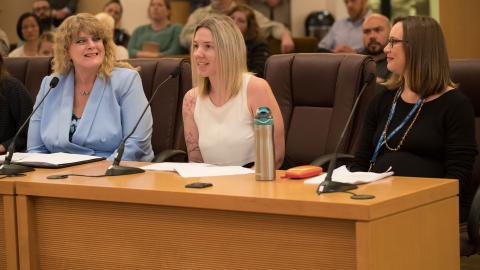 From left: IDEA Employee Resource Group members Jill Jesse, Ashley Carroll and Alison Sachet, Ph.D. of the Department of County Management 