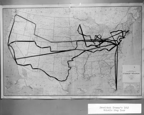 Photo of United States map of President Harry S. Truman's 1948 Whistlestop Tour, with ribbons and pins marking the route and stops on the tour.