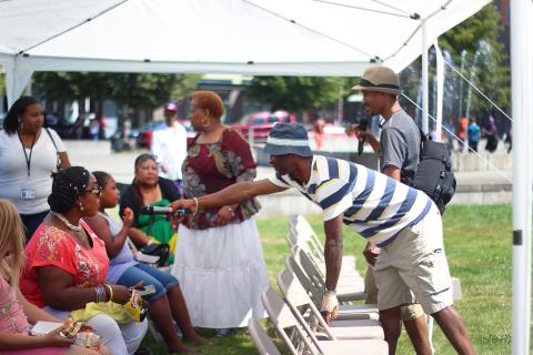 Creative director and Wellness Team member Raz Robertson conducts a health quiz at a recent Highland Haven festival.