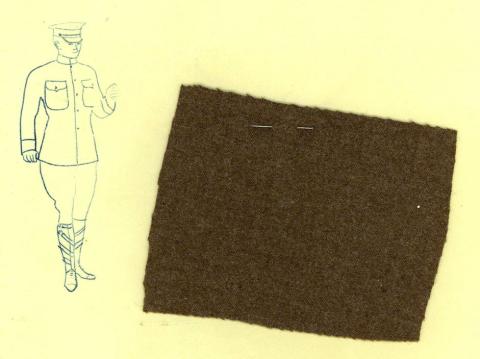 Sketch of a police uniform with a swatch of wool fabric attached.