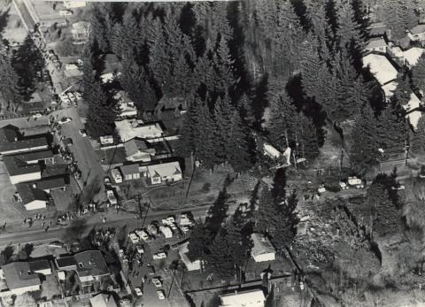 Aerial view of the downed plane in a city neighborhood.