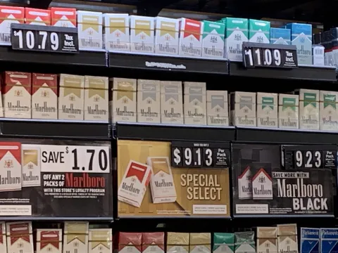 cigarettes for sale in a store display