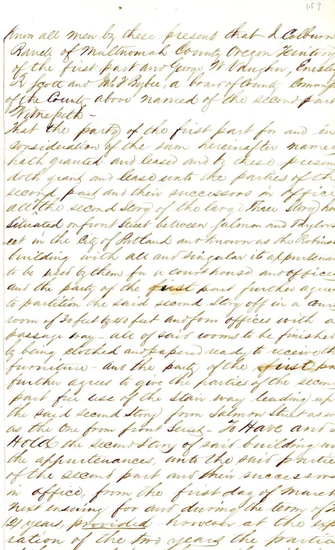 Excerpt of a handwritten 1855 lease for the Robinson Building. Cursive writing is slated and difficult to read without assistance or enlargement.
