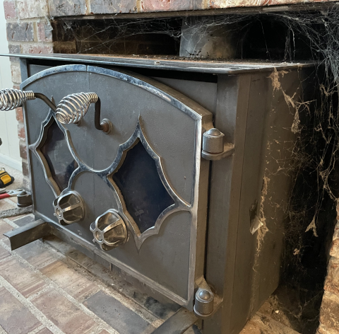 An example of a wood burning stove removed from a client's home.