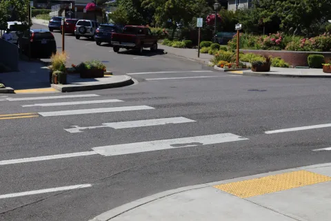 A pair of crosswalks with curb ramps on either end.
