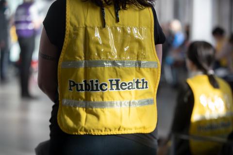Medical reserve corps volunteer wearing a yellow vest