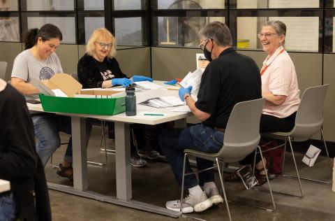 Picture of ballot sorting at the Multnomah Elections office.