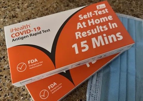 Two packages of COVID-19 self tests