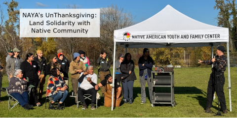 multiple people sitting on fold up chairs and standing up as volunteers for NAYA's Unthanksgiving event