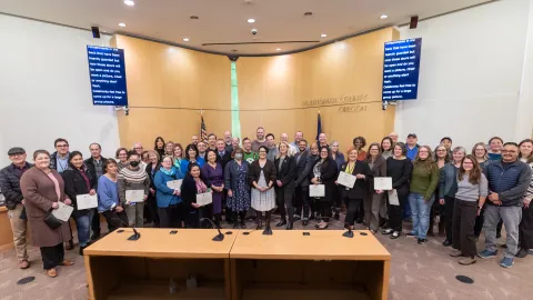 Group of employees celebrating anniversaries in 2023
