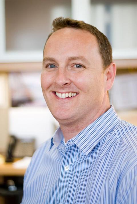 Headshot of Deputy Chief Operating Officer Travis Graves