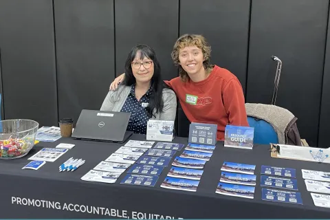 Left to right: County Ombudsperson Cheryl Taylor and Ombudsperson Intake Specialist Kate Milne, at IRCO’s 2024 Winter Health Resource Fair.