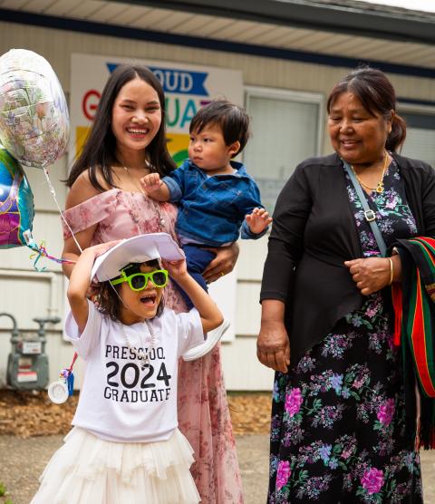 Family at preschool graduation