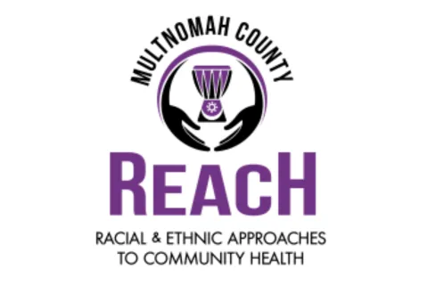Logo image of two hands arching downwards to create a circle with an African Djembé drum in the middle. Text that says: 'Multnomah County' is arched above the image. Text that says: 'REACH, Racial and Ethnic Approaches to Community Health' are below the image.