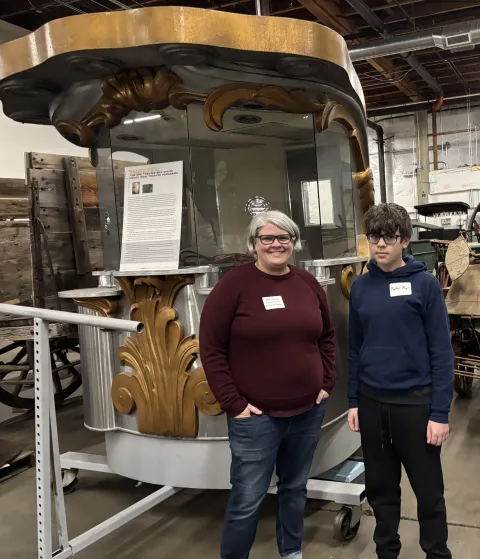 Oregon Historical Society vault tour picture of Commissioner Meghan Moyer and her son.