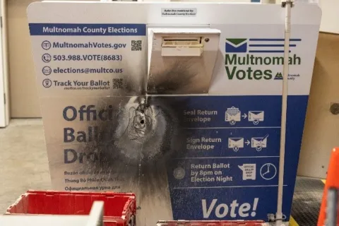 Multnomah County ballot box with damage from an incendiary device.