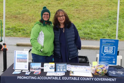 Multnomah County Auditor Jennifer McGuirk and County Ombudsperson at Hillsdale Farmers' Market