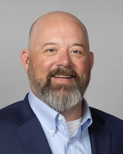 Headshot photo of Deputy Chief Operating Officer Jeston Black